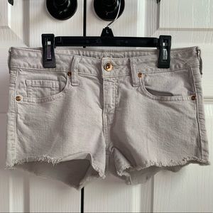 Light gray low-rise denim shorts
